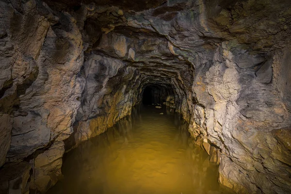 An old abandoned mining facility an ore mine tunnel system underground