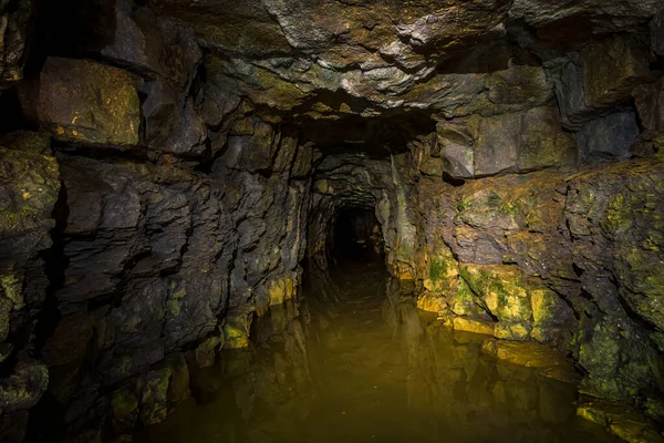 An old abandoned mining facility an ore mine tunnel system underground