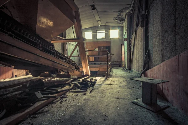 Creepy abandoned industry area with natural decay so-called lost place a decayed factory hall