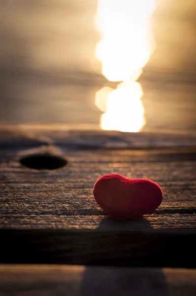 Red heart on sunset — Stock Photo, Image