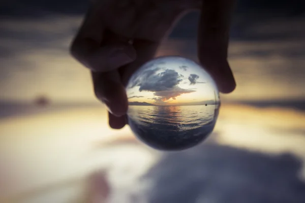 Glass ball on dusk. — Stock Photo, Image