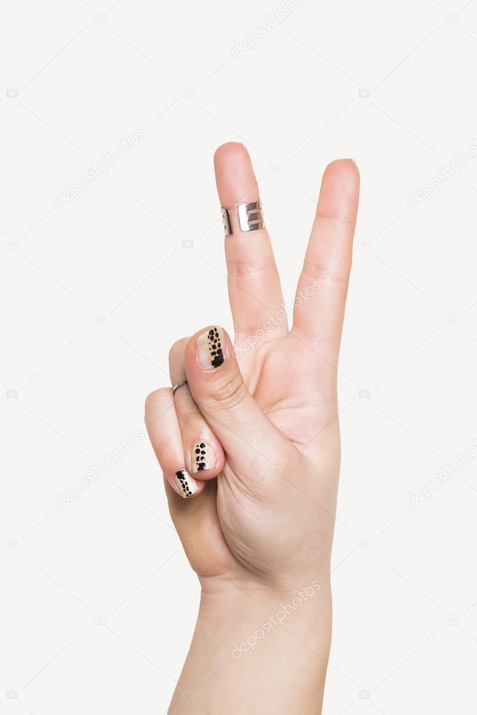 Fingers showing peace sign