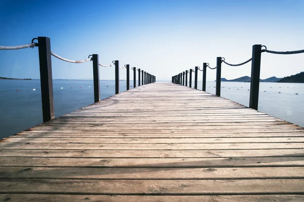 Wooden pier on sea. — Stock Photo, Image