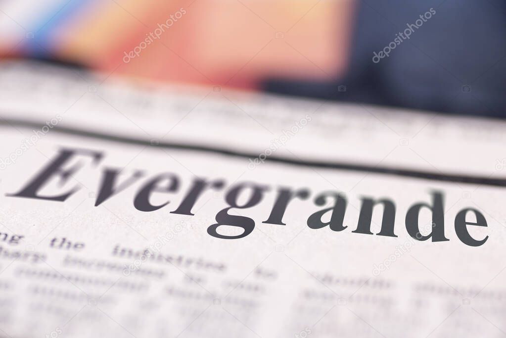 Evergrande written newspaper close up shot to the text.