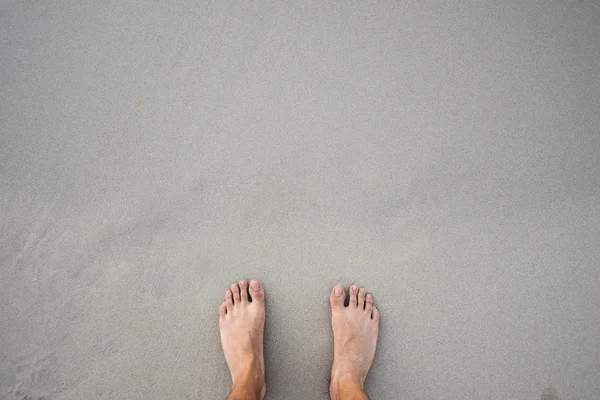 Voeten en zand — Stockfoto