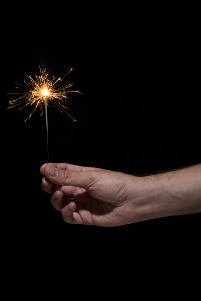 Wunderkerze in der Hand. — Stockfoto