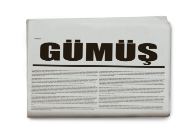 Bir gazetenin ön sayfasının 90 derecelik açısıyla çekilmiş bir fotoğraf. 