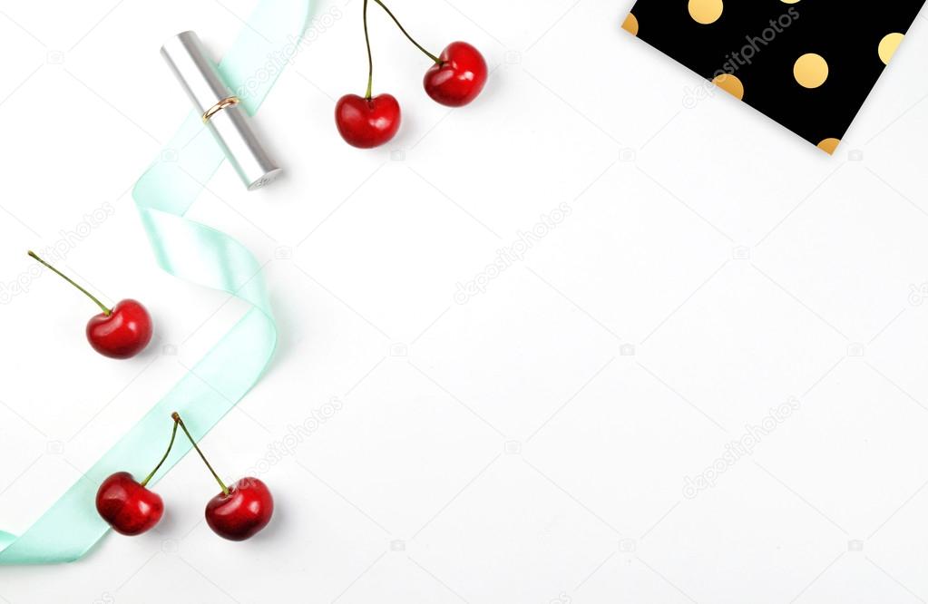 white background, cherry and polka pattern, silver lipstick, mint. modern background, woman style