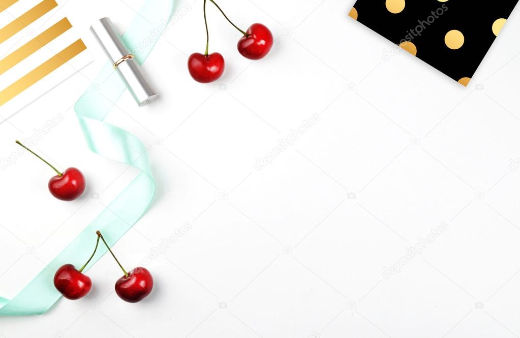 white background, cherry and polka pattern, silver lipstick, mint. modern background, woman style