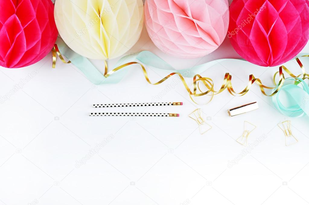 colorful balls, party and glamour style, gold accessories. White background.  Balls blush and yellow., table view woman