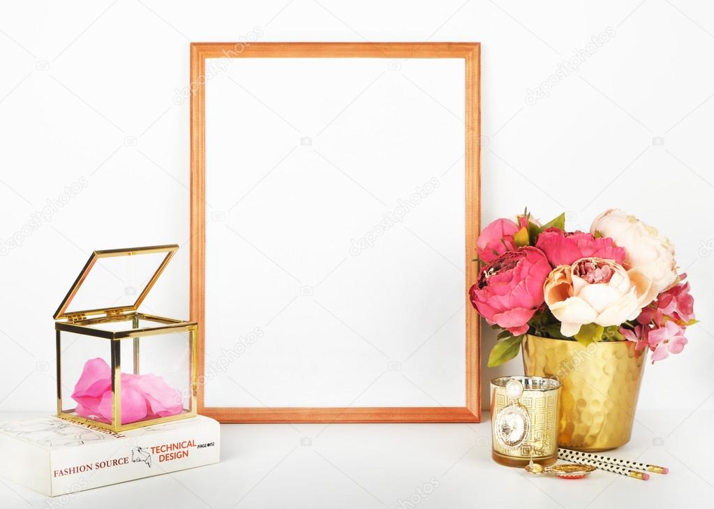 Gold frame mock-up, and white wall with gold vase, and peonies. Place work