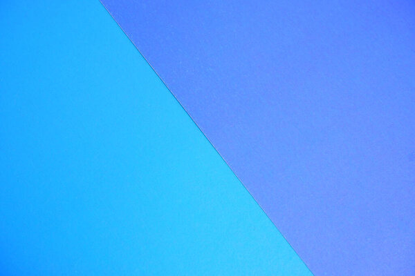 Синий фон. Фон из цветной бумаги. Текстура.