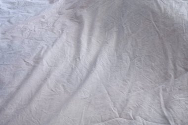 Beyaz battaniye. Çarşaf. Yatağa. İç mekan. Doku. Arkaplan