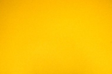 Sarı arka plan. Kartonun dokusu..