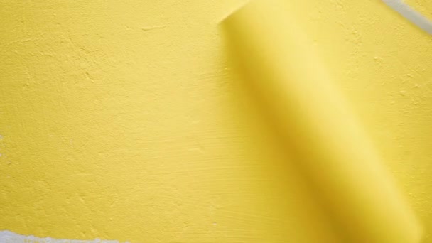 Painting Wall Paint Roller Yellow Color Moves Quickly Different Directions — Stock Video