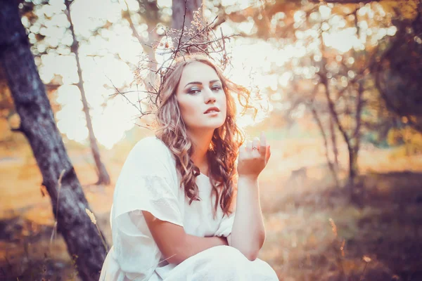 Portrait of beautiful girl with magic eyes in dress — Stock Photo, Image