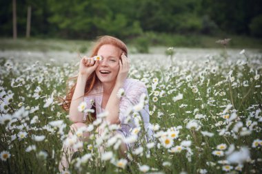 Beautiful woman enjoying field, harmony concept