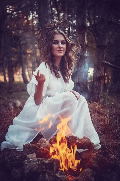 Portrait of beautiful girl with magic eyes in dress — Stock Photo, Image