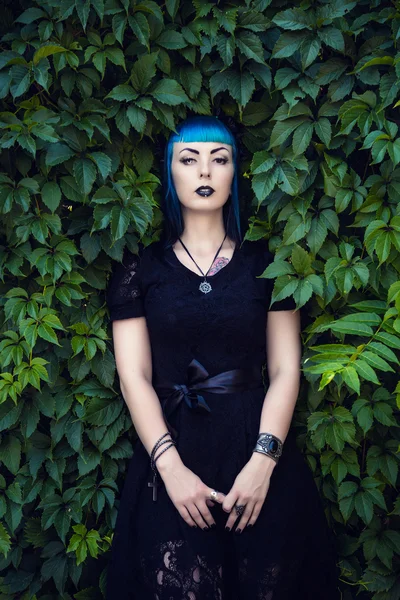 Beautiful goth girl with bright blue hair — Stock Photo, Image