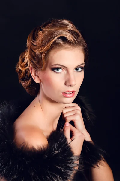 Elegant young woman in black lingerie posing at studio. — Stock Photo, Image