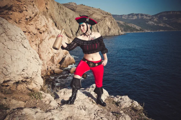 Portrait of a pirate woman at the beach — Stock Photo, Image