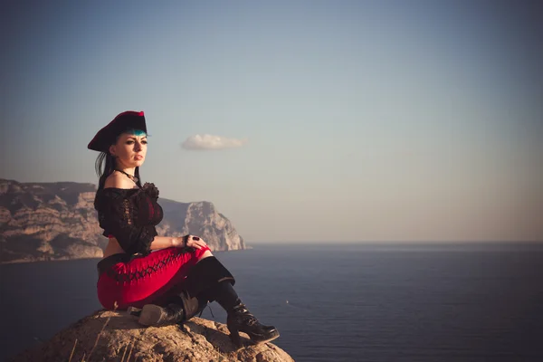 Portrait of a pirate woman at the beach — Stock Photo, Image