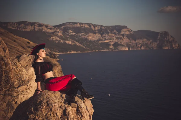 Portrait of a pirate woman at the beach — Stock Photo, Image