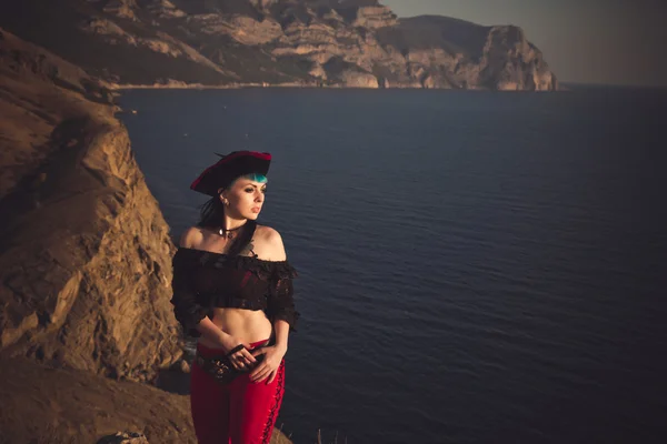 Portrait of a pirate woman at the beach — Stock Photo, Image