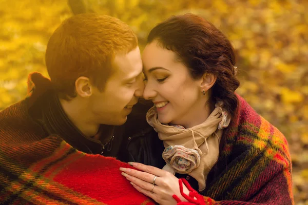 Happy young couple in love meeting on the autumn leaf — Stock Photo, Image