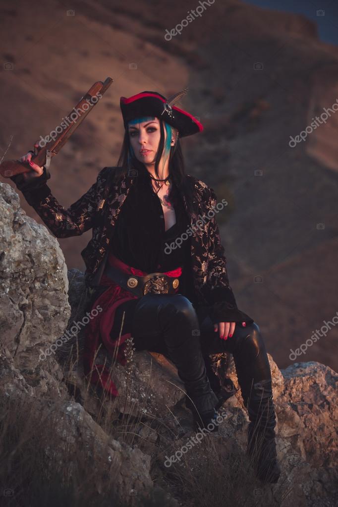 Retrato de una mujer pirata en la playa: fotografía de stock © Selenittt  #65027743