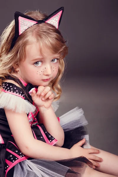 Girl in a dress with cat ears — Stock Photo, Image