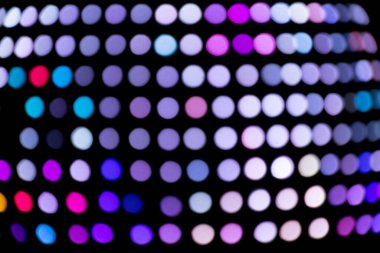 Renkli soyut bokeh arkaplanı. Geceleri kış süslemeleri..