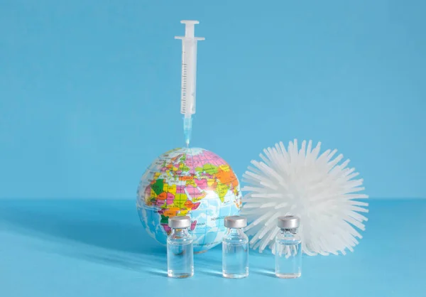 Conceptual photo for worldwide pandemic vaccination, beginning of mass vaccination for coronavirus COVID-19, influenza or flu, world immunization. Selective focus