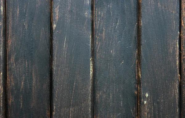 Parede de tábuas de madeira escura — Fotografia de Stock