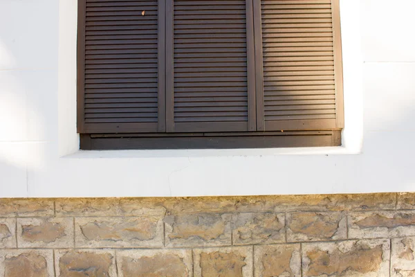 Shutters for windows and dark wood — Stock Photo, Image