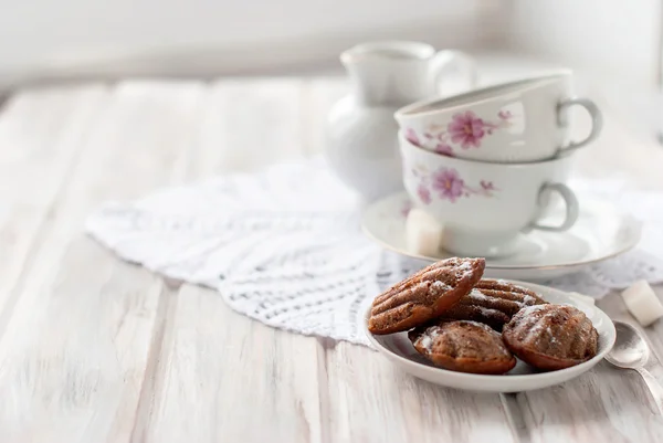 Homemade cookies and nuts with a cup of tea — Stock Photo, Image