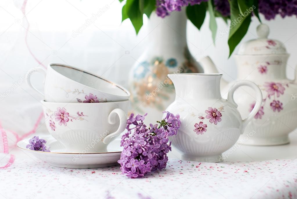 sprig of lilac in a cup