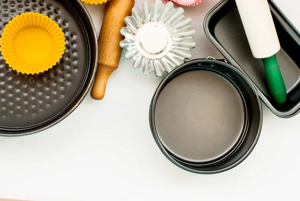 Closeup ahşap arka plan üzerinde pişirme aletleri