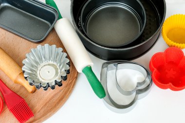 Closeup ahşap arka plan üzerinde pişirme aletleri