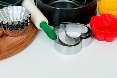 Closeup ahşap arka plan üzerinde pişirme aletleri