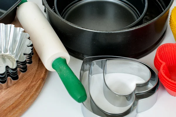 Appliances for baking closeup on wooden background — Stock Photo, Image