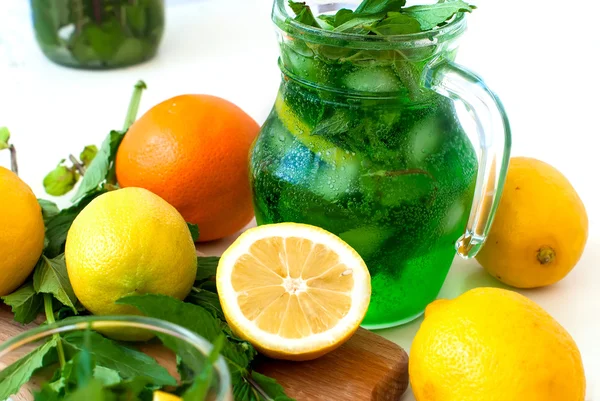 Green mojito cocktail with ice and mint — Stock Photo, Image