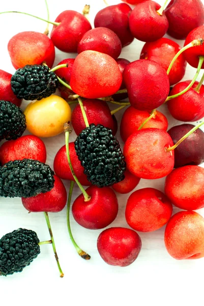 Juicy ripe berries on a white background closeup — Stock Fotó