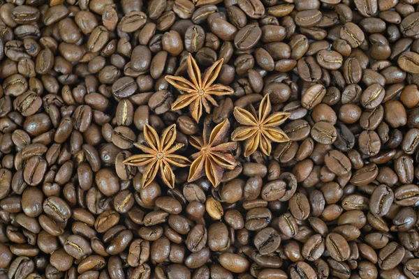 Lots of coffee beans. And four anise stars. Pattern.