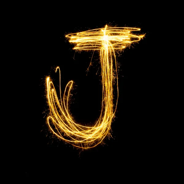 Sparkler firework light alphabet J. — Stock Photo, Image