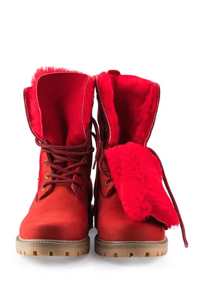 red winter boots made of genuine leather, isolate on a white background