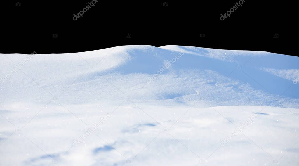 white snowdrift with blue shadows, isolate on a black background