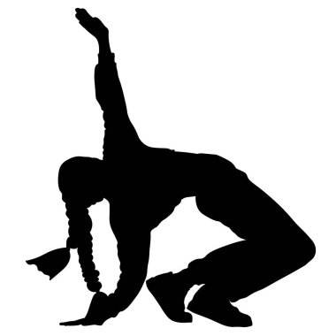 Genç bir kız modern bir dansla hareket eder.