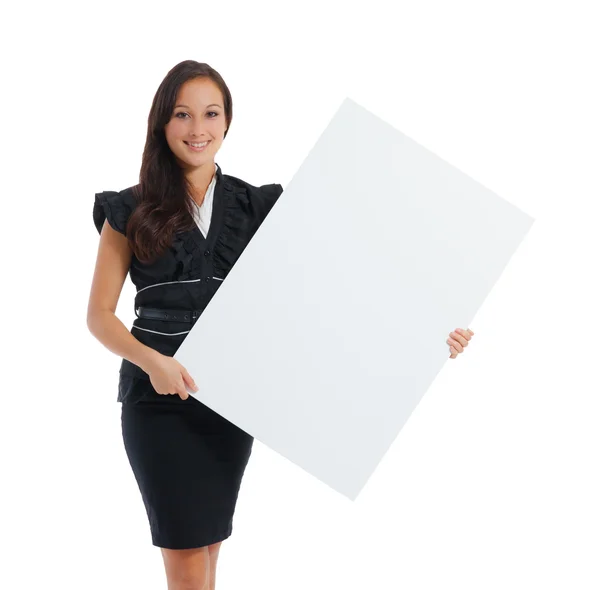 Young woman holding at blank card in her hand — Stockfoto