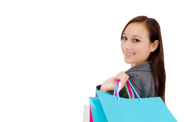 Impresionante mujer joven llevando bolsas de compras — Foto de Stock